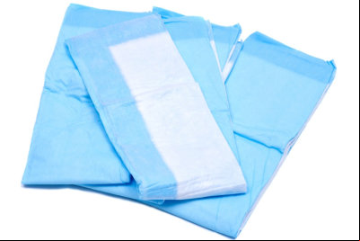 Medium size blue under pads for adults isolated on white background